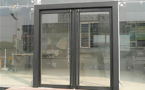 景泰玻璃地弹门